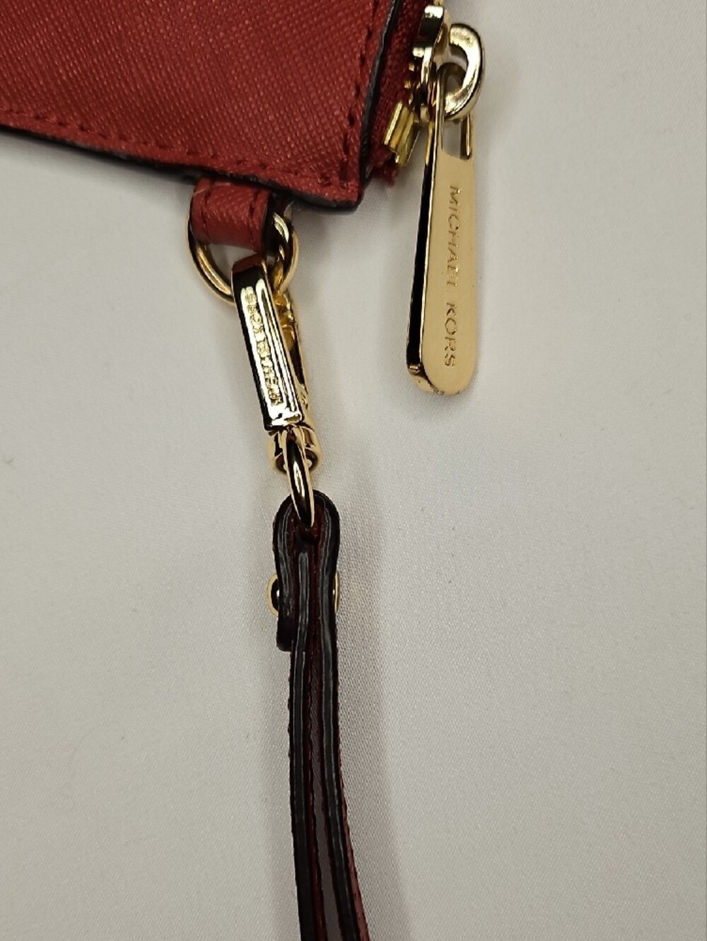 Michael Kors Saffiano 9x6in. Leather Wristlet- Burnt Orange EUC - Picture 6 of 13